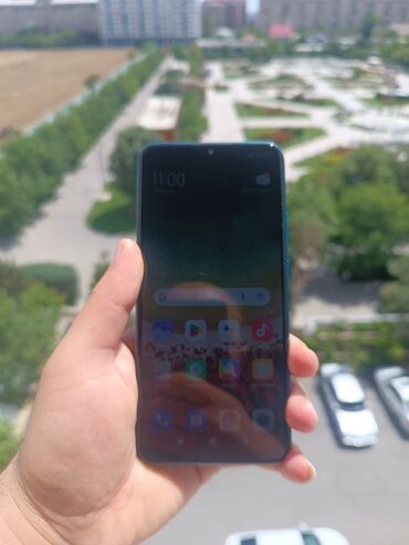 Xiaomi: Xiaomi Redmi 9, 32 ГБ, цвет - Синий, 
 Отпечаток пальца, Беспроводная зарядка, Две SIM карты