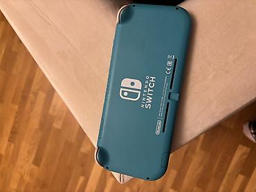 nintendo switch 3 lite: Nintendo Switch Lite – türkuaz rəngdə portativ oyun konsolu — 5
