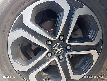 Диск колесный легкосплавный Honda с фирменным центральным колпачком H