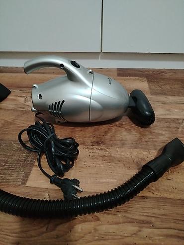 Ručni usisivači: Ručni električni usisivač – Candy Star (mrežni, sa dodacima) Opis: - — 1