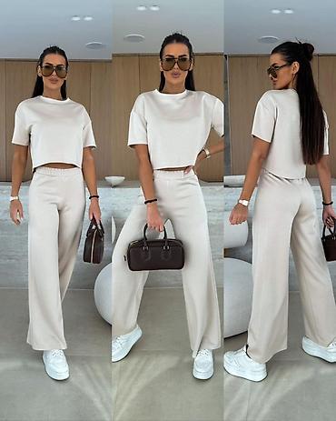 phantom cizme: Zenski komplet – široke pantalone + kratka majica
1800 din
S M L XL — 2
