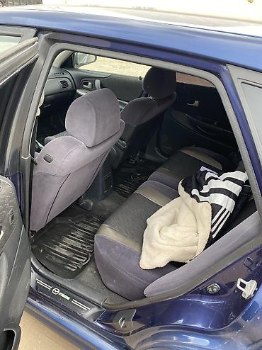 Mazda: Mazda 323: 2000 г., 1.8 л, Механика, Бензин, Хэтчбэк — 7