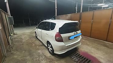 чехлы бу: Honda Fit: 2002 г., 1.3 л, Вариатор, Бензин, Хэтчбэк — 6