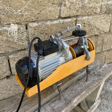 Mişarlar: Yük qaldırma işləri üçün nəzərdə tutulmuş elektrikli qaldırıcı. Trosla