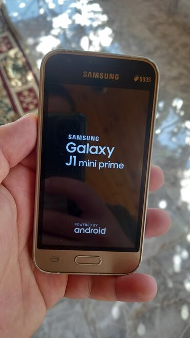 52 telefon: Samsung Galaxy J1 Mini, 8 GB, rəng - Qızılı, Sensor, İki sim kartlı