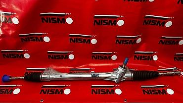 Рулевая рейка (механизм рулевого управления) для автомобиля Nissan. -