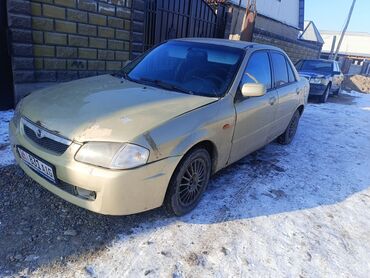 Mazda: Mazda 323: 1998 г., 1.6 л, Механика, Бензин, Седан