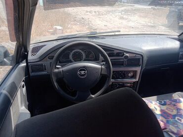 диск на некси: Автомобиль Daewoo Nexia с кузовом седан и золотистой окраской. Модель