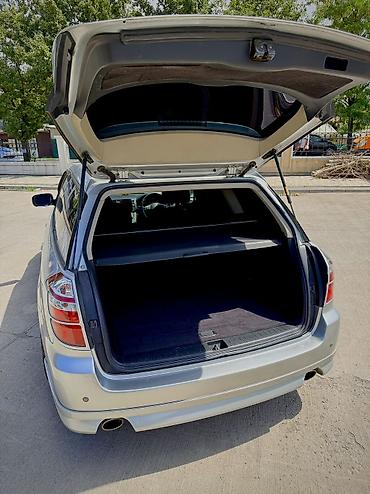 жена: Subaru Legacy: 2005 г., 2 л, Автомат, Бензин, Универсал — 5
