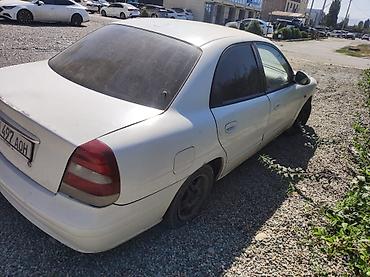 мед алимин: Daewoo Nubira: 2000 г., 1.5 л, Механика, Газ, Седан — 5