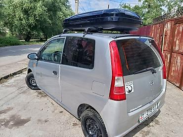 bus: Daihatsu Cuore: 2005 г., 1 л, Механика, Бензин, Купе — 5