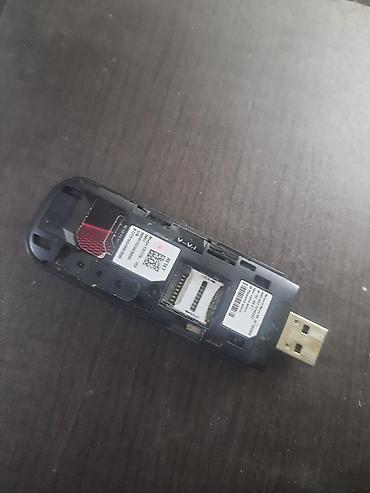 dji mic 1: USB‑модем 3G/4G с разъёмом для SIM‑карты и слотом microSD. - — 1
