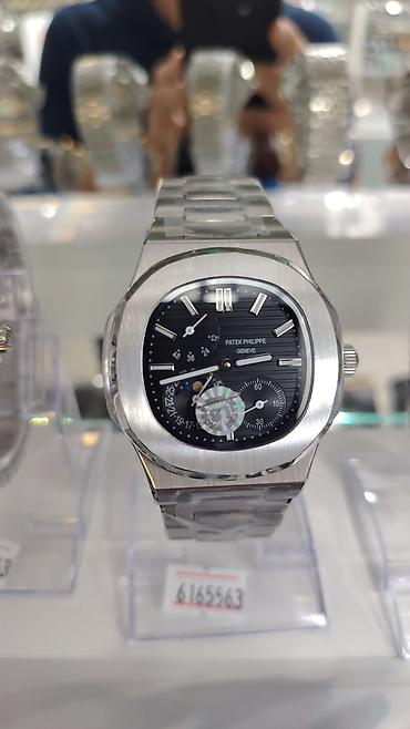casio saat: Patek Philippe Nautilus stili kişi qol saatları – çoxfunksiyalı, zərif — 1