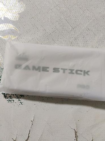 Игровая приставка Game Stick Pro (4K) с двумя беспроводными геймпадами — 4