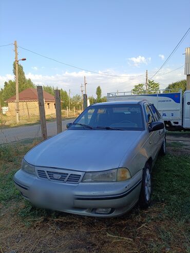 деу нексия автомат: Серебристый седан Daewoo Nexia с характерной решеткой радиатора и