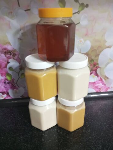 молочные каровы: Натуральный мёд в пластиковых шестигранных банках с завинчивающимися