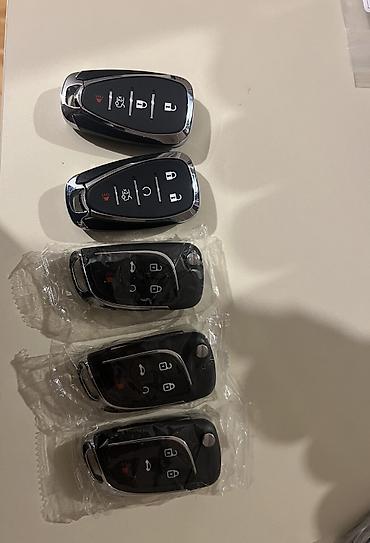 knopkalı: Chevrolet açar korpusları. 4-5 knopkalı pultlar mövcuddur — 1