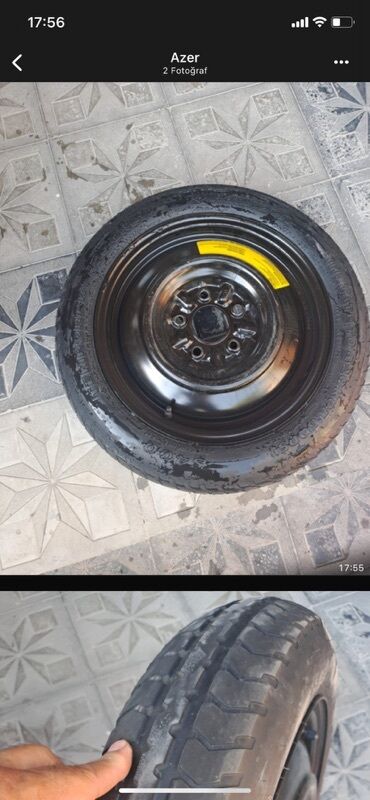Disk təkərlər: Avtomobil üçün ehtiyat təkər. Qara rəngli diski olan bu təkər, yol