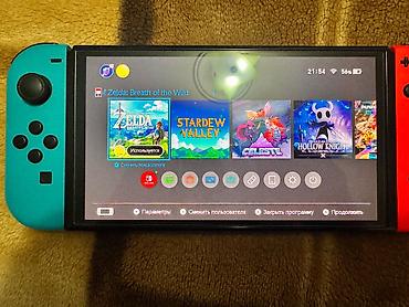 nintendo da: Nintendo Switch (OLED model) oyun konsolu – neon qırmızı və neon mavi — 5