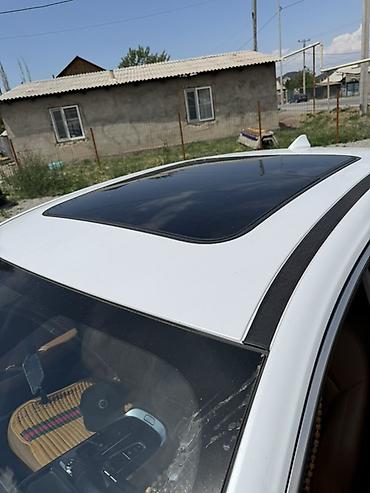 byd e1: GAC Aion S — электрический седан белого цвета. Машина полный родной — 6