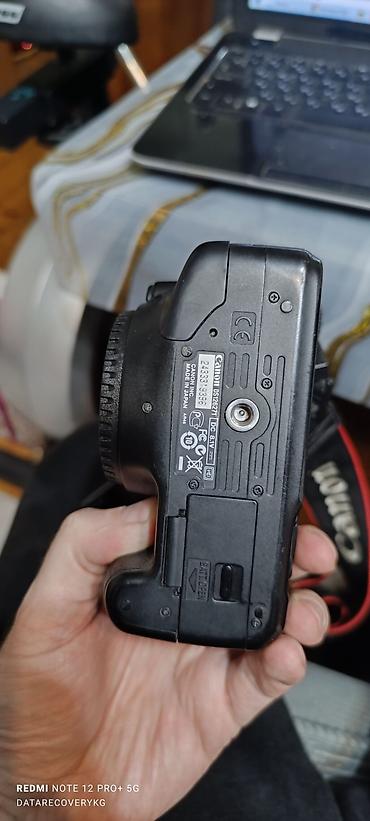 Фотоаппараты: Canon EOS 550D, тушка, батарейка, зарядник — 3