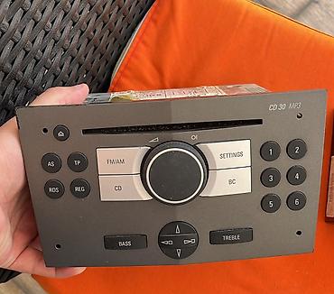 ucuz masin manitoru: Opel CD 30 MP3 avtomobil maqnitofonu Xüsusiyyətlər: - CD və MP3 — 1