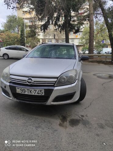 ilkin odenis 2000 azn olan masinlar: Opel Astra: 1.4 l | 2005 il 700000 km Universal