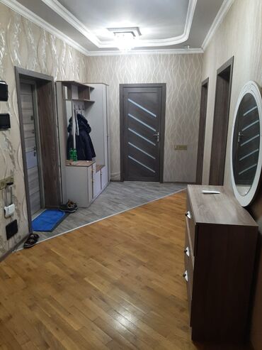 Uzunmüddətli kirayə mənzillər: - Geniş işıqlı zal: divan, divar tipli TV (LG), kondisioner, dekorativ — 6