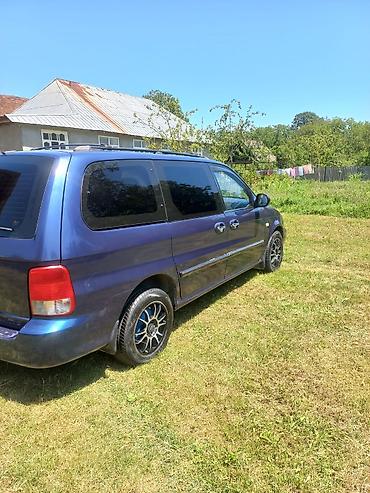 Kia: Kia Carnival: 2.9 l | 2002 il Van/Minivan — 13