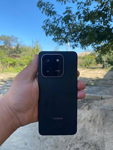 Мобильные телефоны: Honor X7d, 256 ГБ, цвет - Черный, Две SIM карты — 4