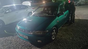 Mazda: Mazda Familia: 1997 г., 1.6 л, Автомат, Бензин, Седан — 4