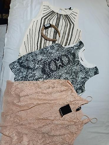 Kompleti: Ženski komplet – 3 topa + rajf - Elegantan krem bezrukavnik sa — 1