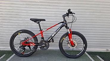 Детские велосипеды: Детский велосипед в синем цвете, оснащенный дополнительными боковыми — 15