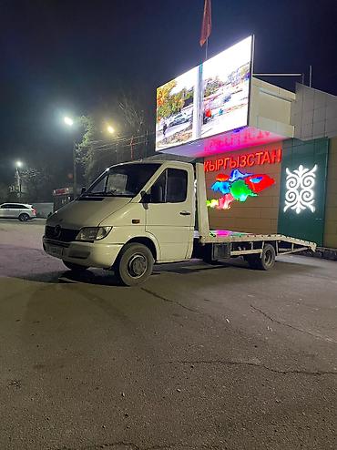 Услуги эвакуатора: С лебедкой, С ломаной платформой — 12