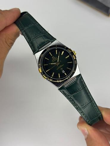 Şəxsi əşyalar: Omega Constellation kişi saatı – Avtomatik mexanizmli - Korpus — 9