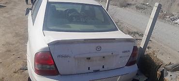 джили авто: Mazda Familia: 2000 г., 1.6 л, Механика, Дизель, Седан — 4