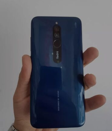 telefon yaddas karti qiymetleri: Xiaomi Redmi 8, 32 ГБ, цвет - Синий, 
 Сенсорный, Отпечаток пальца, Две SIM карты