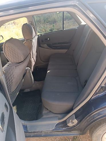 прокладка впускного коллектора: Mazda 323: 2001 г., 1.6 л, Механика, Бензин, Универсал — 6