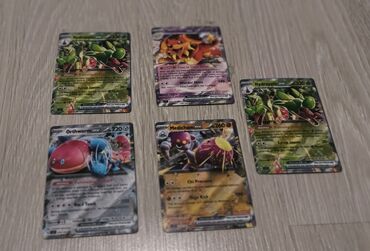 Марки: Müxtəlif Pokémon personajları ilə bəzədilmiş beş ədəd ticarət kartı