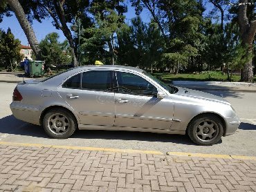 Mercedes-Benz E 220: 2.2 l | 2004 year Sedan