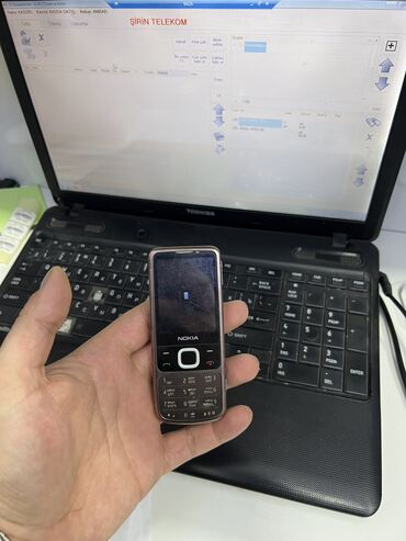 телефон для пожилых людей fly: Nokia 6700 Slide, цвет - Коричневый, Две SIM карты