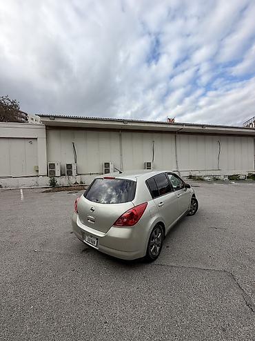 m50n satisi: Nissan Tiida: 1.6 l | 2008 il Hetçbek — 2