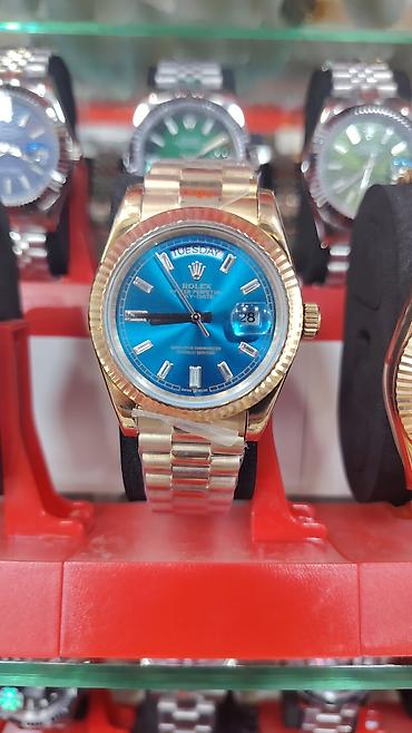 3d saat: Rolex Oyster Perpetual Day‑Date qol saatları - Korpus və qolbaq — 3