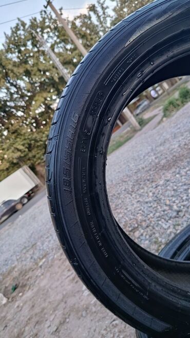 авто шыны: Автомобильная шина с размером 185/55R16, предназначенная для легковых