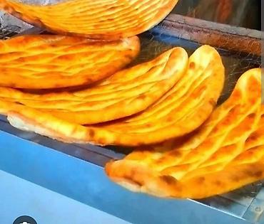 Un məmulatları: Memarecemi,Xırdalan tereflerde market daxilinde tendirçi xanimlar — 1