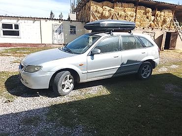 авто салон: Mazda 323: 2002 г., 1.6 л, Механика, Бензин, Универсал — 3