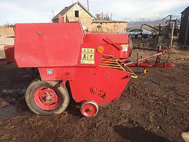 Тюковые пресс-подборщики: Пресс-подборщик тюковый UNIA-FAMAROL (польский) - Тип — 16