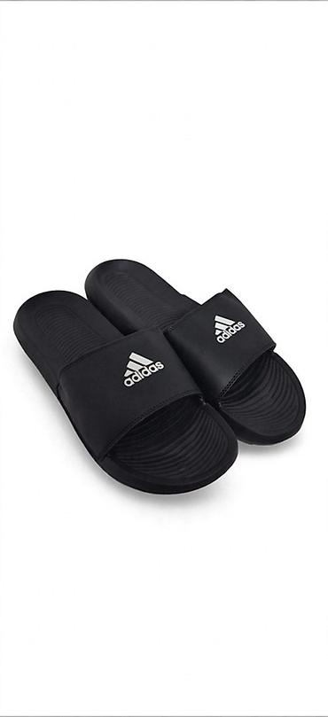 air green: Adidas crne papuče – model sa jednim širokim kaišem preko risa. - — 1