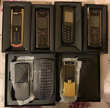 noki 6131: Premium dizayna malik düyməli mobil telefonlar dəsti. Şəkillərdə bir — 1