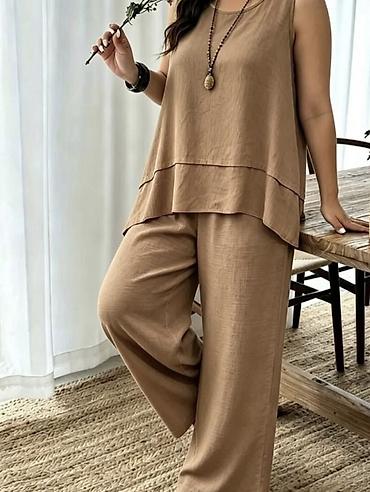 lakovane pantalone: Komplet tunika siroka bez rukava i široke pantalone. - Model — 2